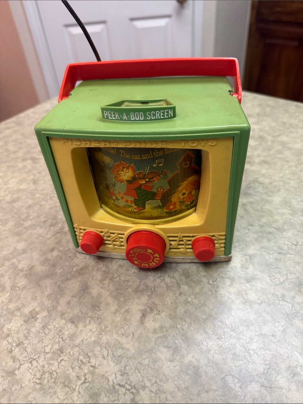 Vintage Fisher-Price Peek-A-Boo Screen Toy TV in Green, Yellow and Red